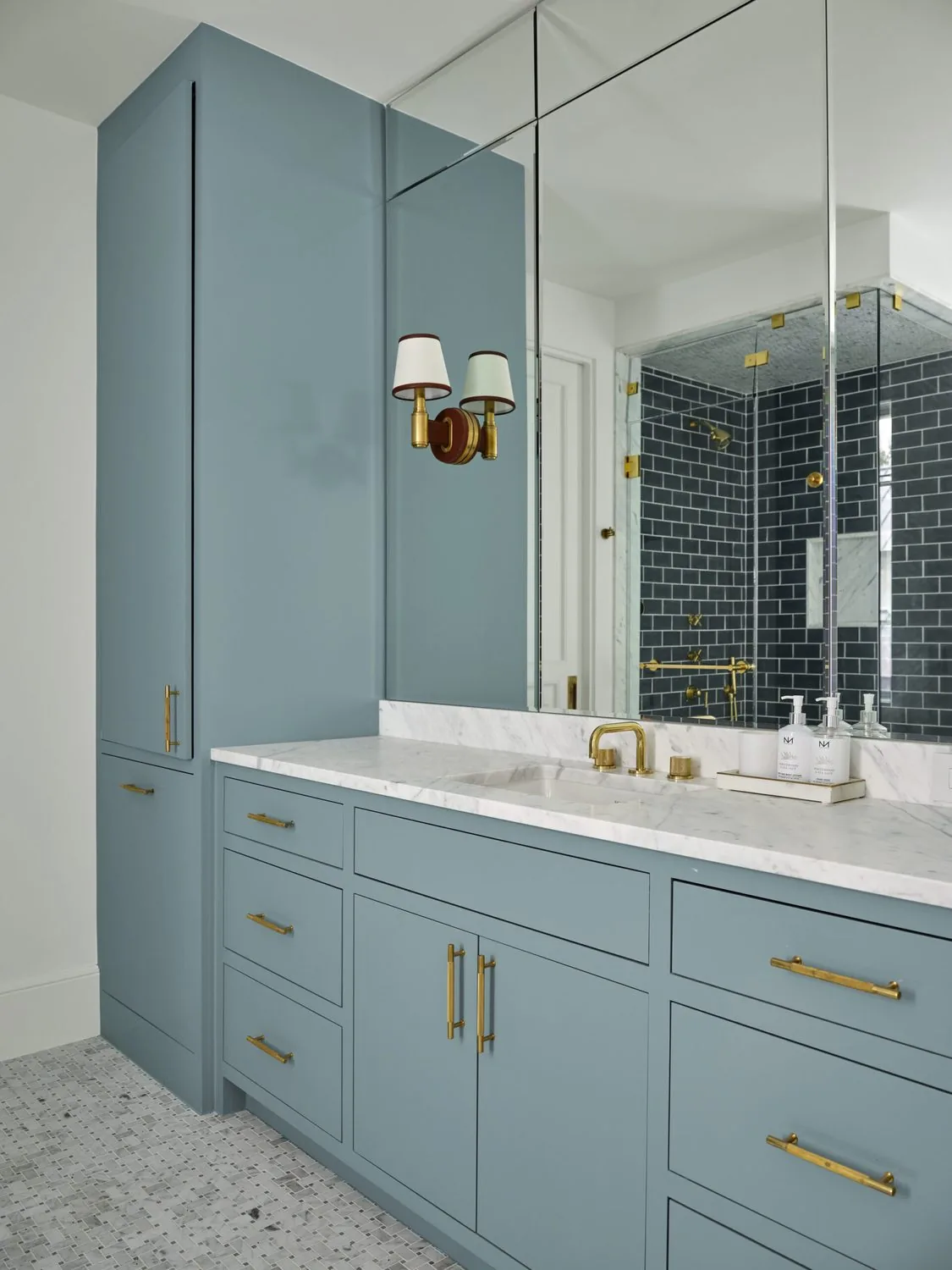 A vanity in soft blue lacquer with unlacquered brass fittings